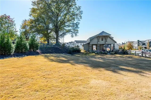 a view of a pathway along with potted plants