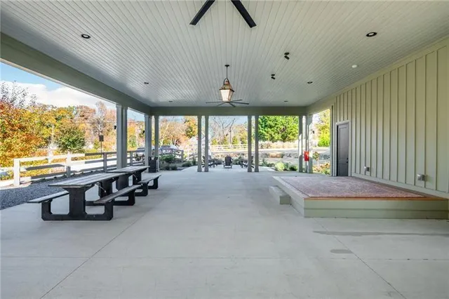 a picture of a bench in front of a wall