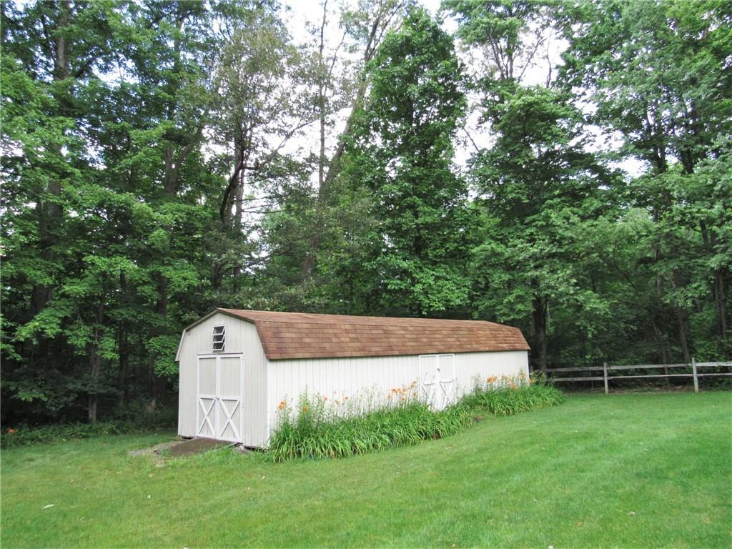 809 Back Creek Road Champion, PA 15622 - Photo 22 of 25 Double doors on the end and in the middle. The parcel goes just into the woods.