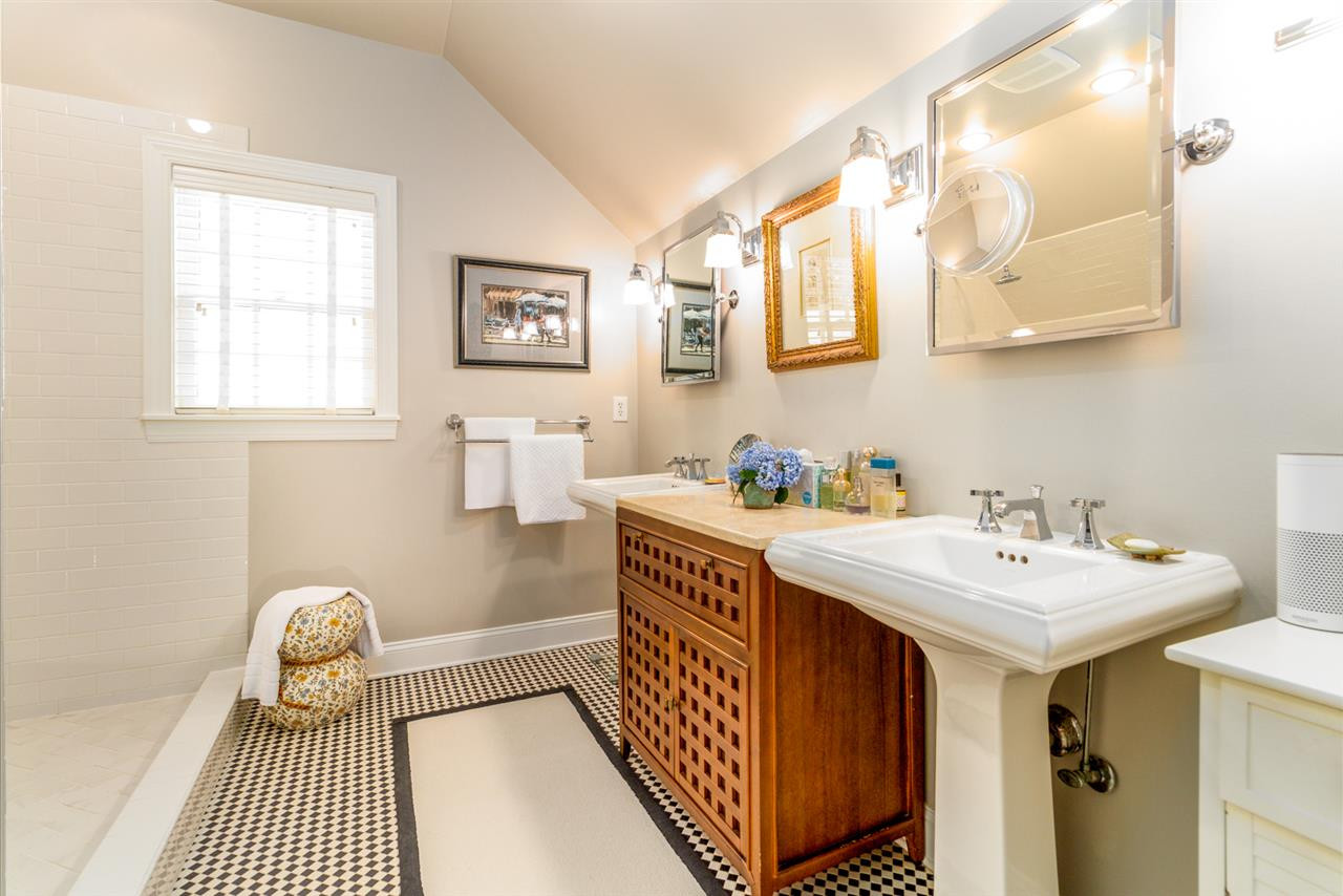 1321 Brooks Avenue Raleigh, NC 27607 - Photo 18 of 30 Owners love this bathroom, it's not only beautiful with His/Hers sinks but also has a double shower and separate WC. Master Bath