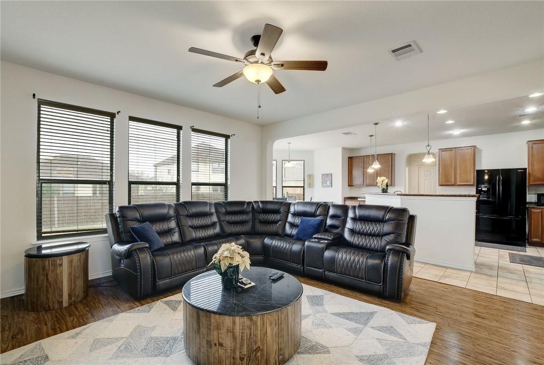 356 Matthews Kyle, TX 78640 - Photo 26 of 30 An open concept living area boasts resilient flooring and abundant natural light.