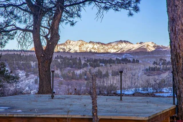 a view of a house with a mountain