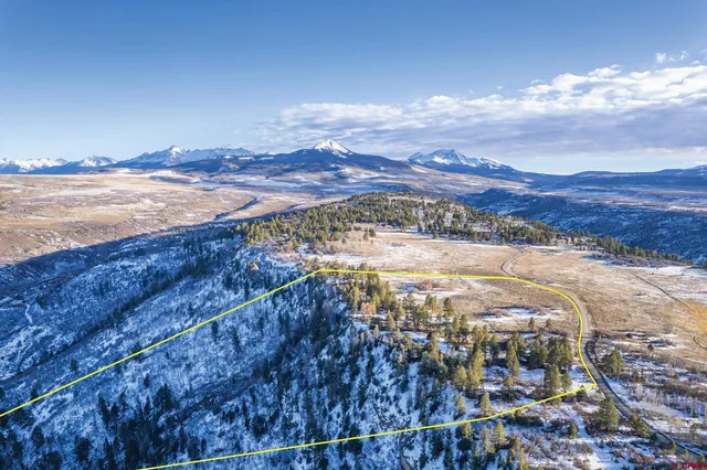 a view of a city with an ocean beach