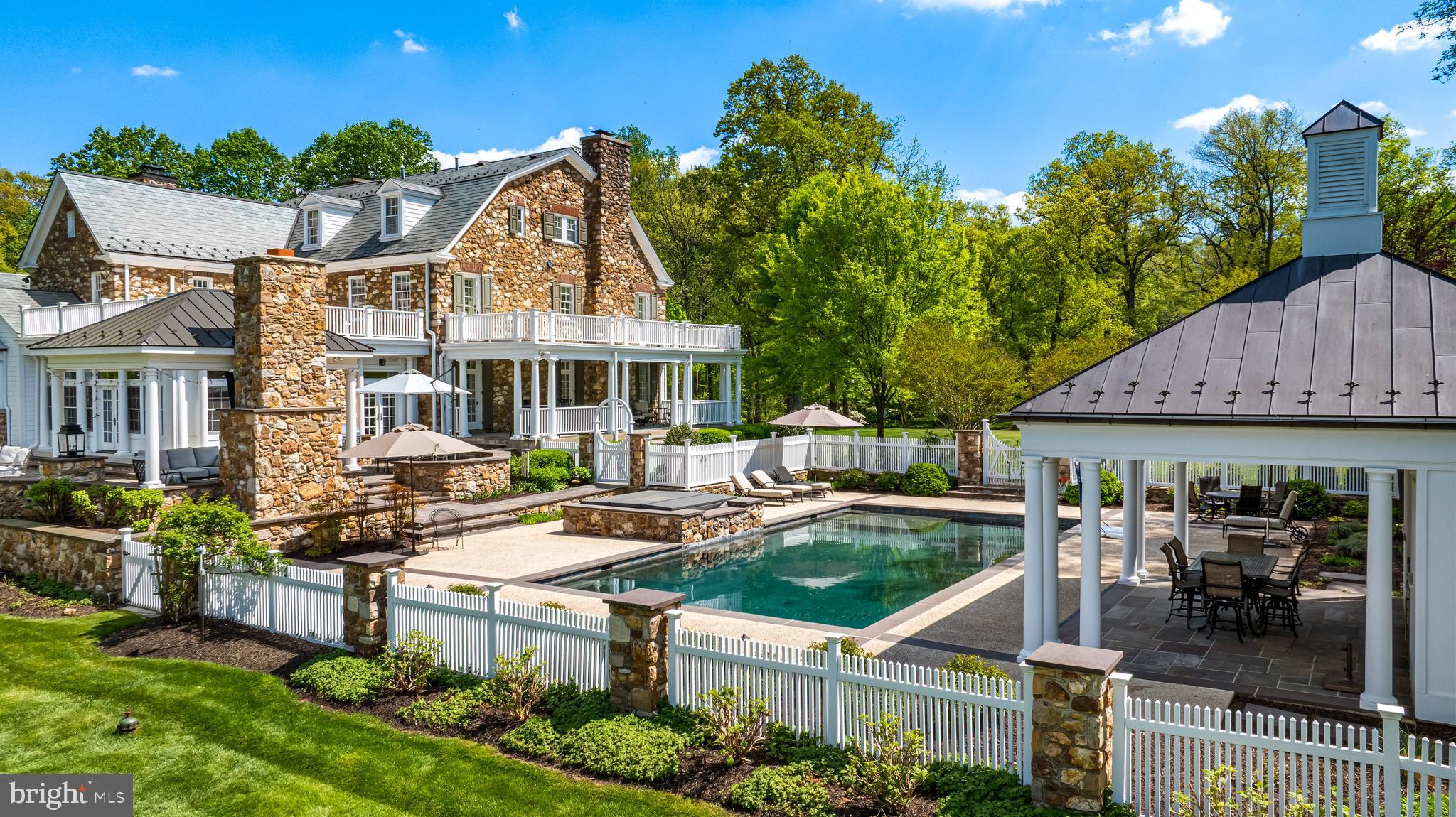 2734 Caves Road Owings Mills, MD 21117 - Photo 4 of 22 a view of a house with swimming pool and sitting area