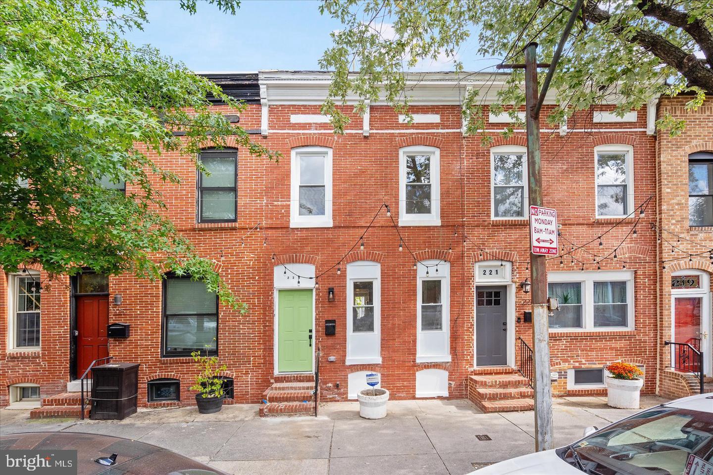 223 North Milton Avenue Baltimore, MD 21224 - Photo 1 of 14 front view of a building