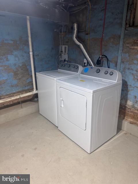 223 North Milton Avenue Baltimore, MD 21224 - Photo 12 of 14 a utility room with dryer and washer