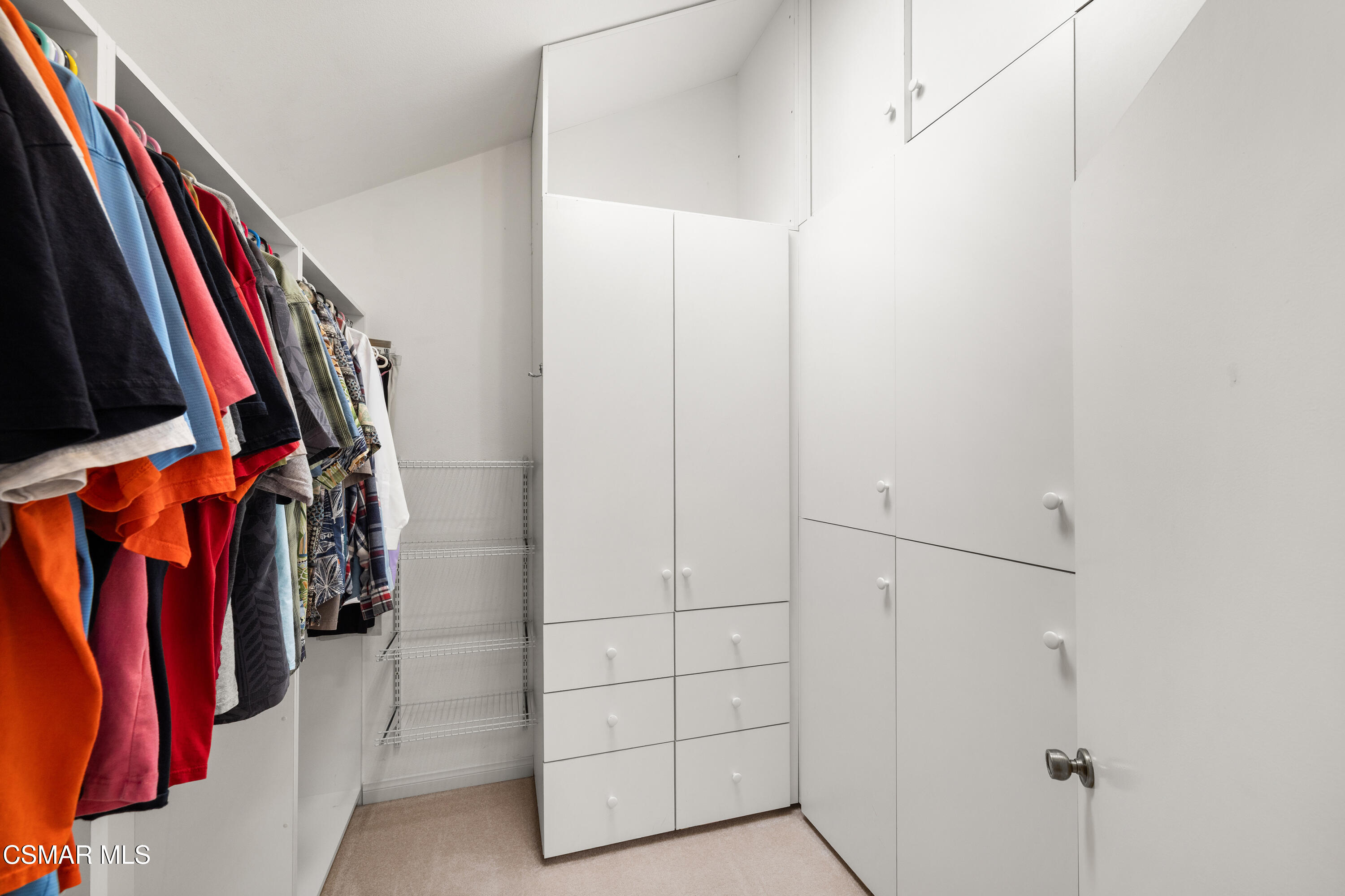 2489 North Greensward Street Simi Valley, CA 93065 - Photo 18 of 37 a view of walk in closet with clothes and shoes
