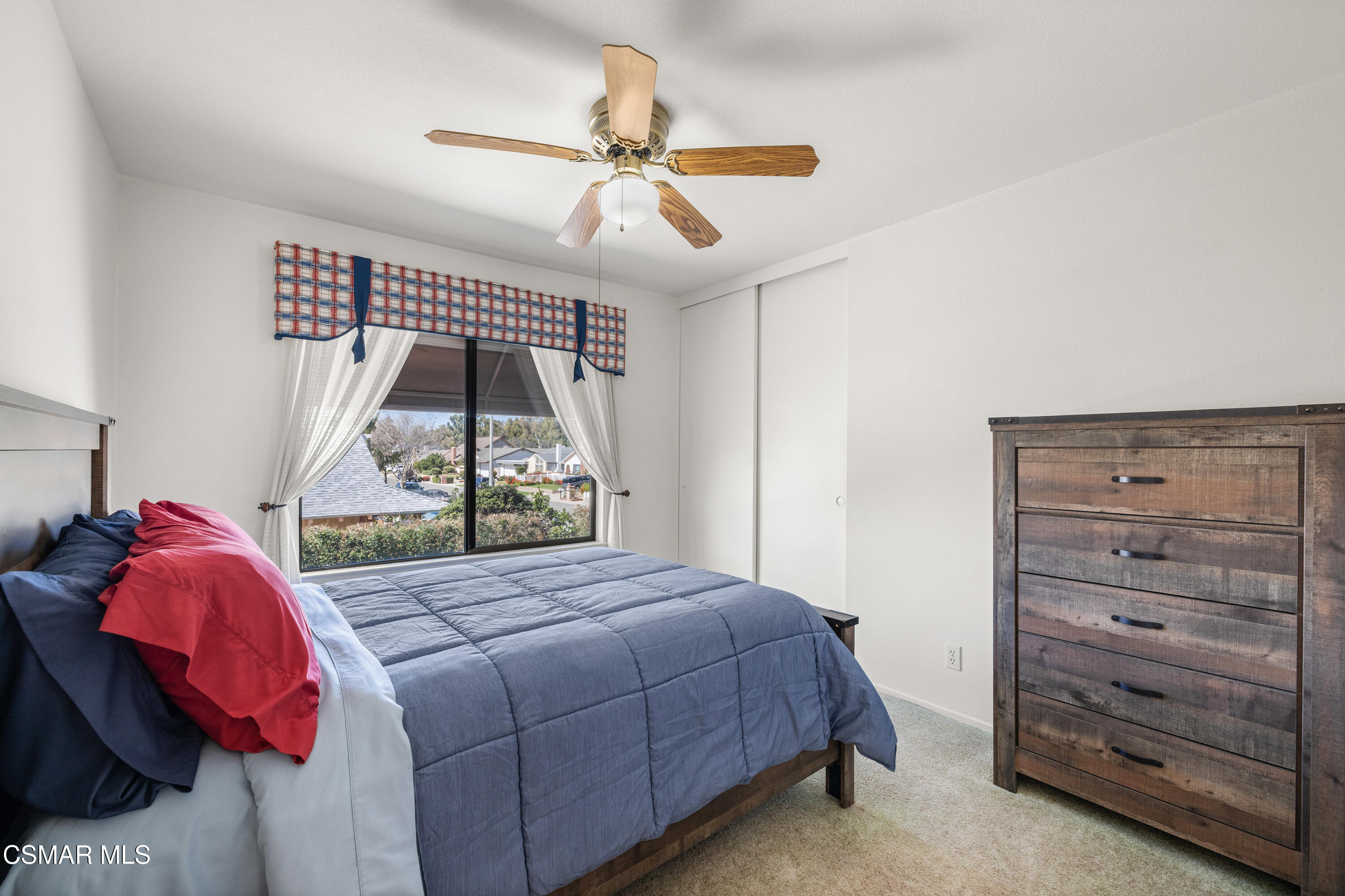 2489 North Greensward Street Simi Valley, CA 93065 - Photo 27 of 37 a bedroom with a bed and a mirror