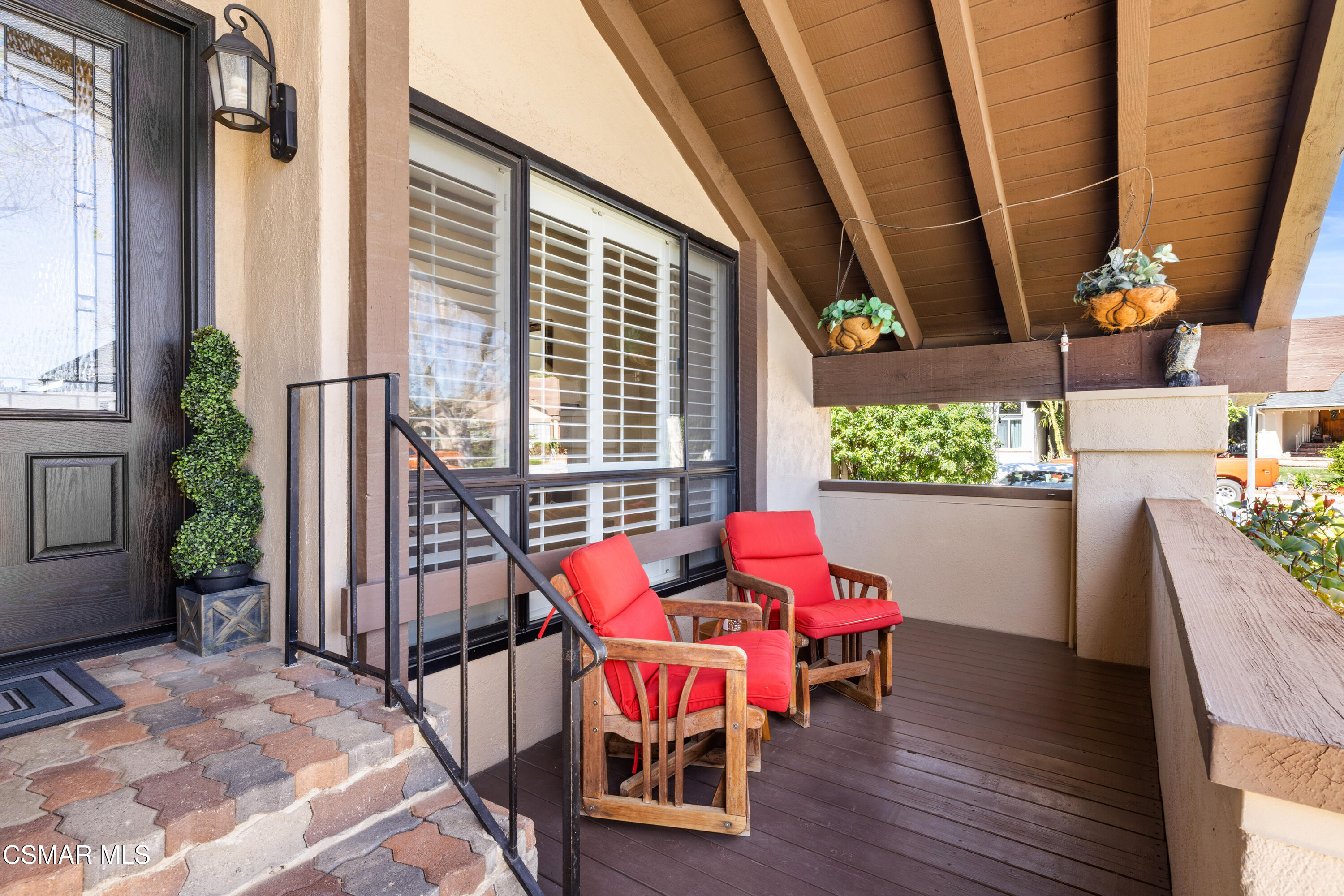 2489 North Greensward Street Simi Valley, CA 93065 - Photo 4 of 37 a balcony with furniture and wooden floor