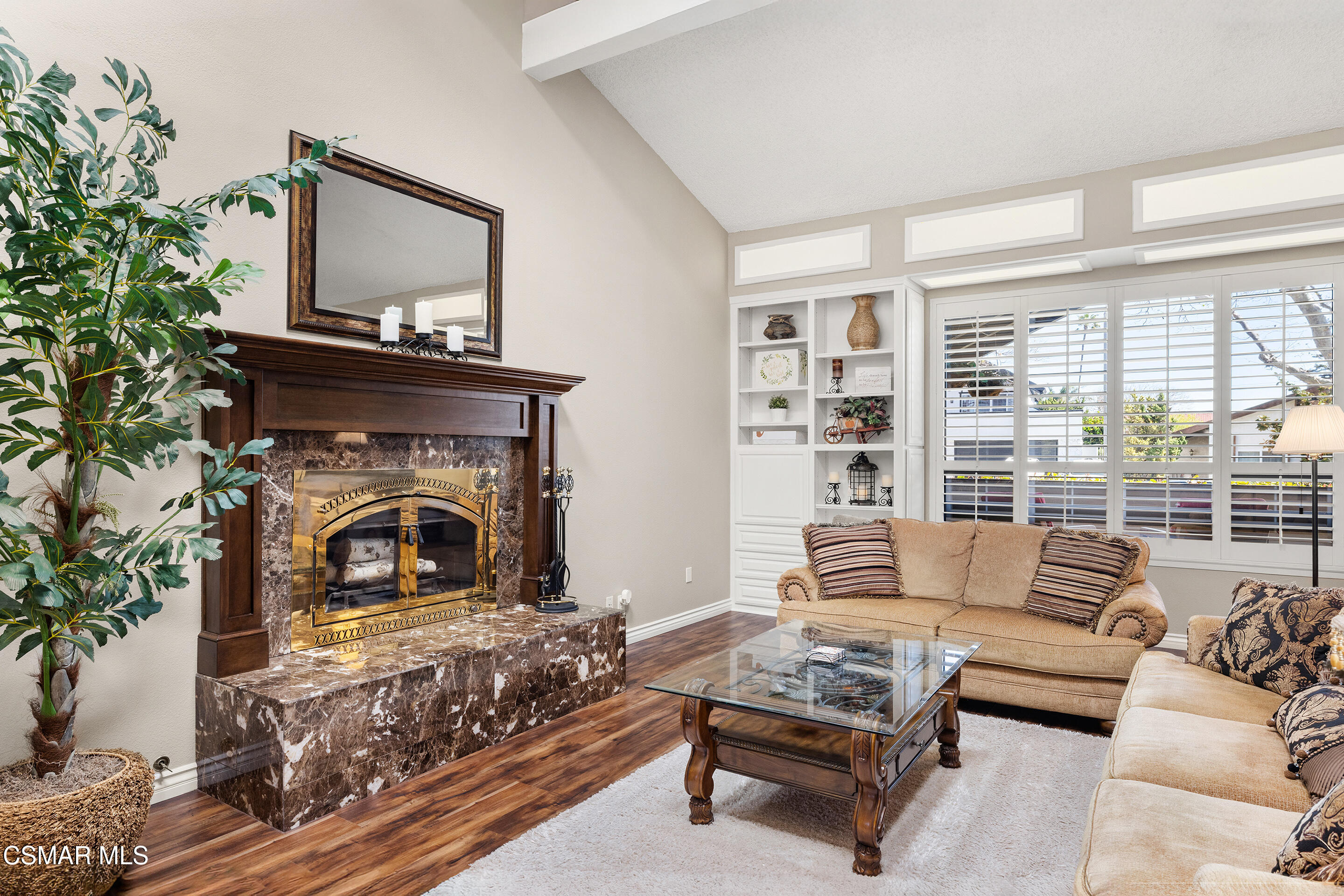 2489 North Greensward Street Simi Valley, CA 93065 - Photo 6 of 37 a living room with furniture and a fireplace
