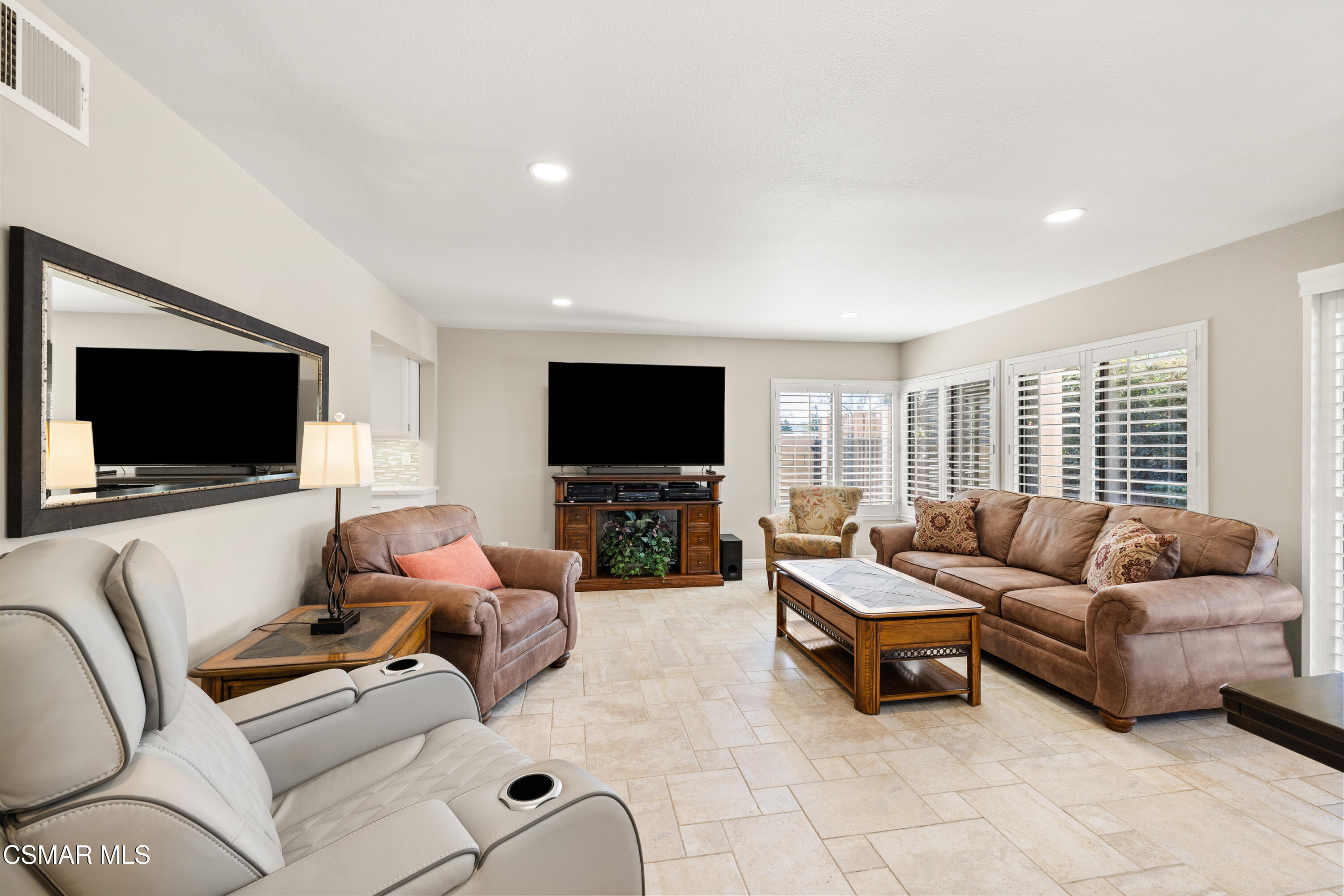 2489 North Greensward Street Simi Valley, CA 93065 - Photo 10 of 37 a living room with furniture and a flat screen tv