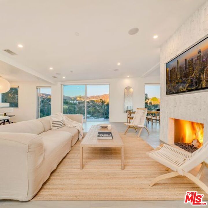 2500 Vasanta Way Los Angeles, CA 90068 - Photo 3 of 22 a view of living room with furniture and floor to ceiling window