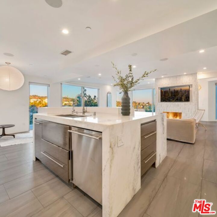 2500 Vasanta Way Los Angeles, CA 90068 - Photo 4 of 22 a kitchen with counter top space sink and stove