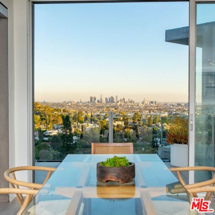 2500 Vasanta Way Los Angeles, CA 90068 - Photo 5 of 22 a view of a swimming pool with a lounge chair