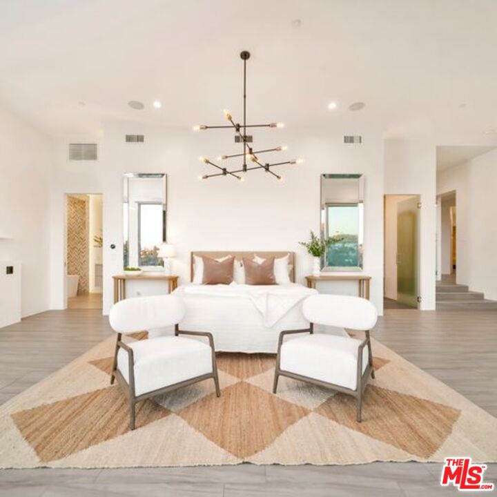 2500 Vasanta Way Los Angeles, CA 90068 - Photo 6 of 22 a living room with furniture and a chandelier