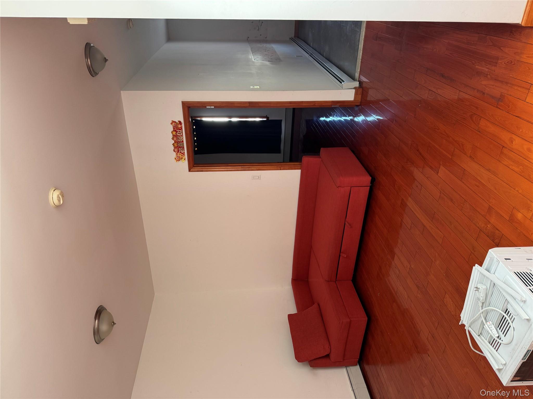 723 45th Street, Unit 2 Brooklyn, NY 11220 - Photo 1 of 1 a room with furniture and wooden floor