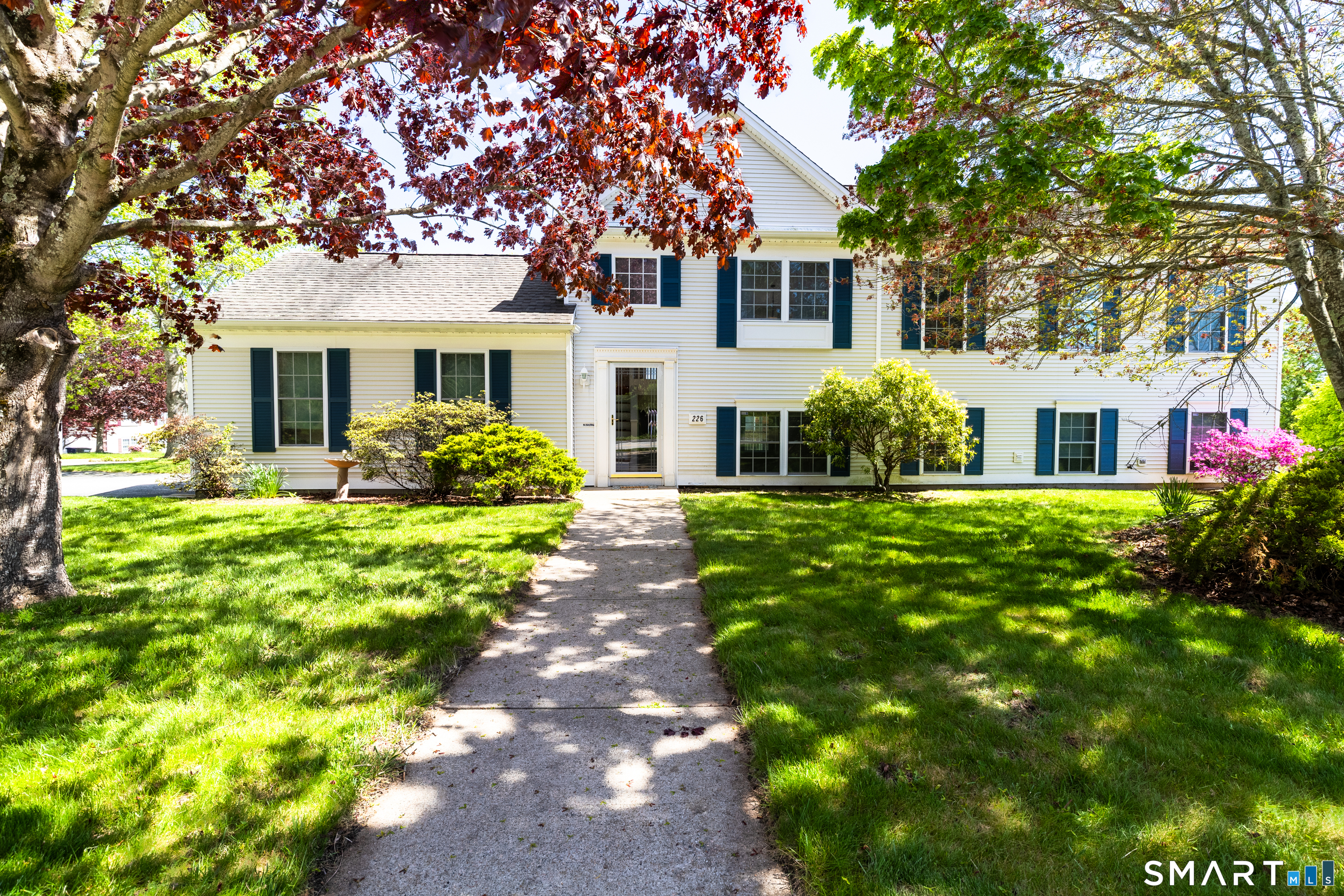 226 Noank Ledyard Road Groton, CT 06355 - Photo 1 of 26 a front view of house with yard and green space