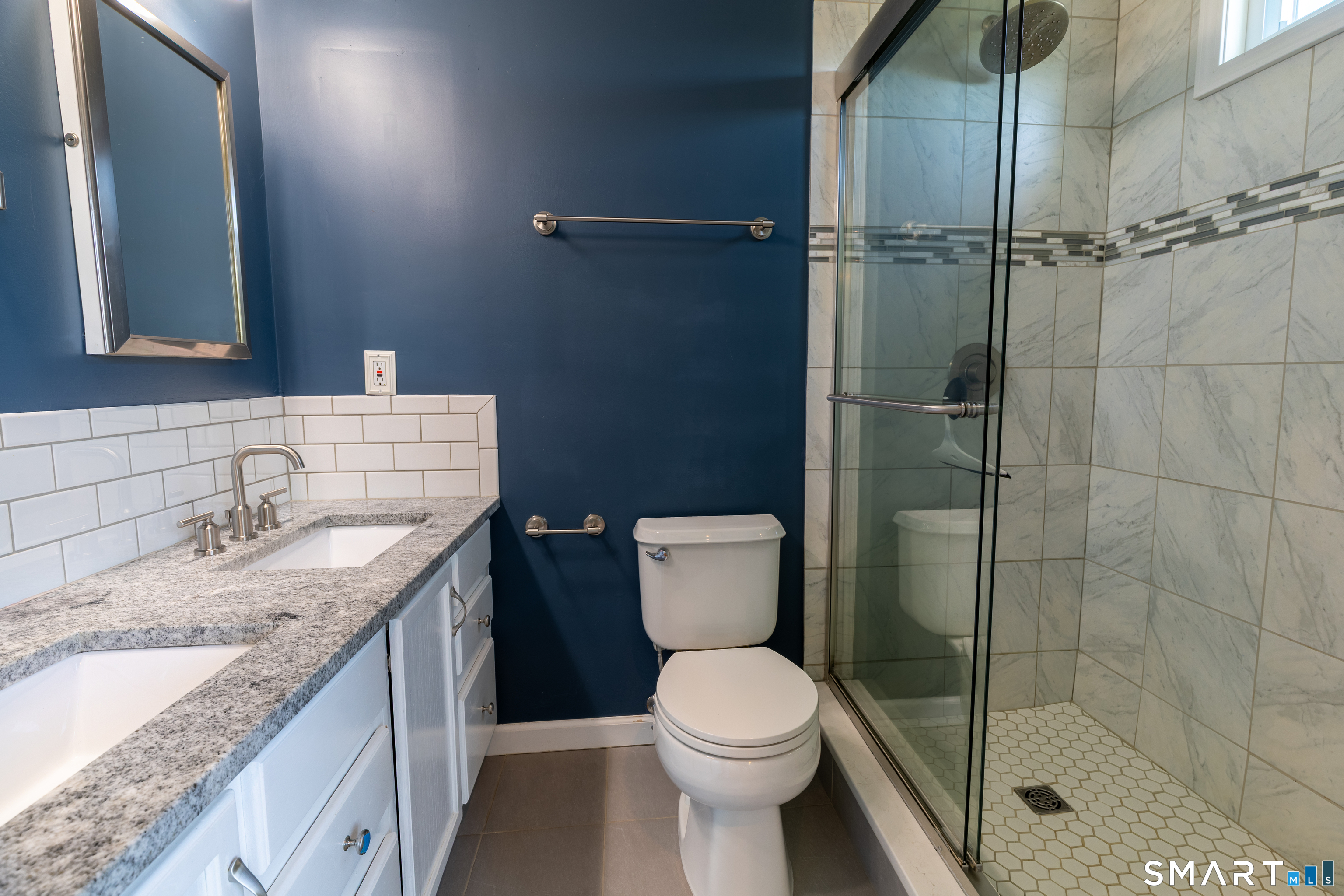 226 Noank Ledyard Road Groton, CT 06355 - Photo 14 of 26 a bathroom with a granite countertop sink toilet and shower
