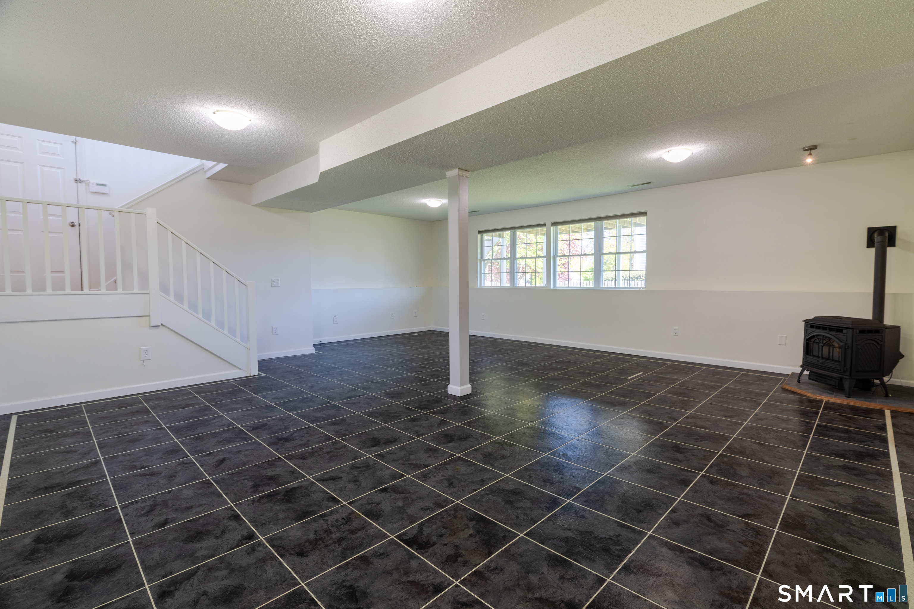226 Noank Ledyard Road Groton, CT 06355 - Photo 16 of 26 a view of an empty room and a window