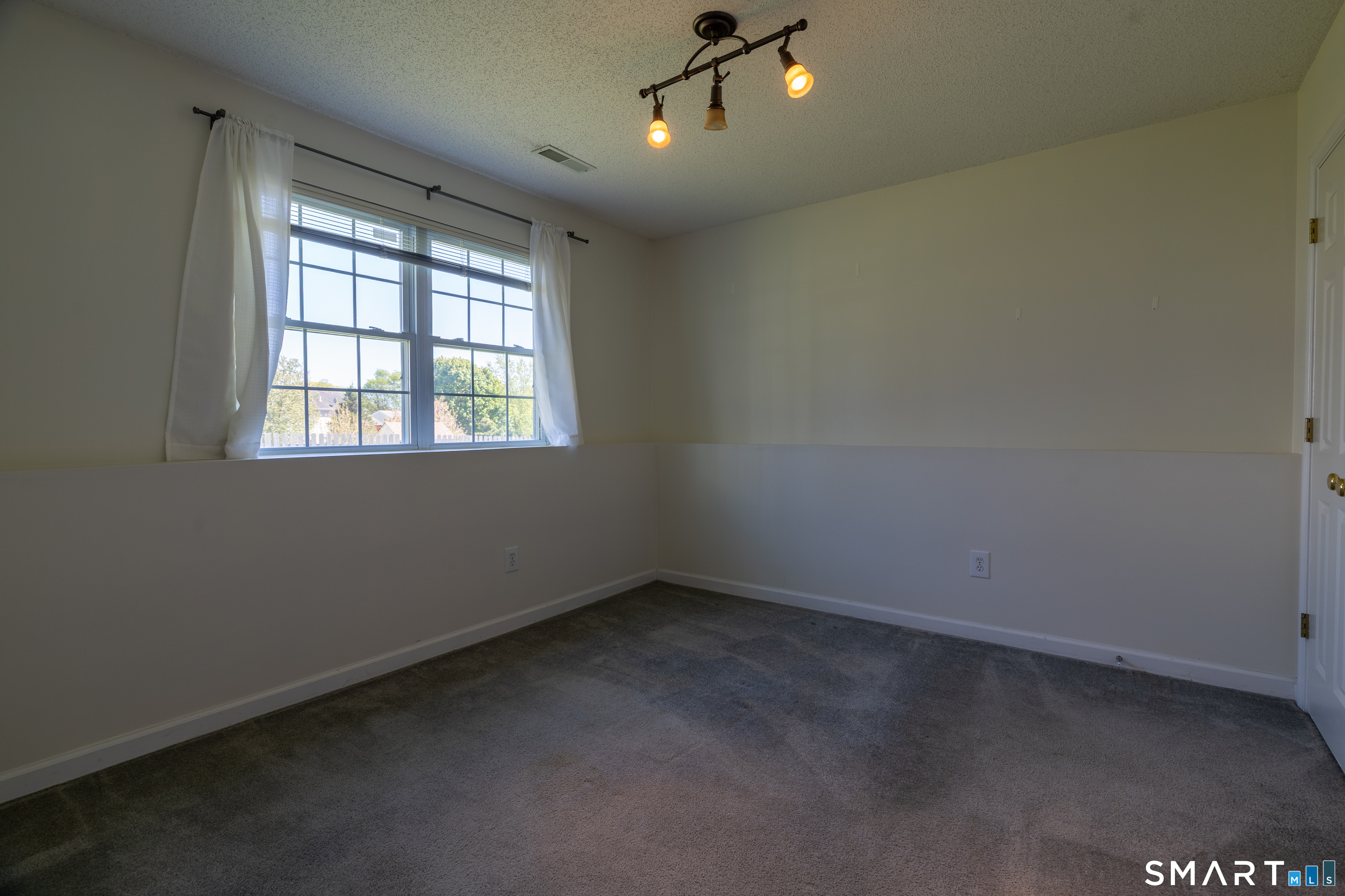 226 Noank Ledyard Road Groton, CT 06355 - Photo 18 of 26 an empty room with a window