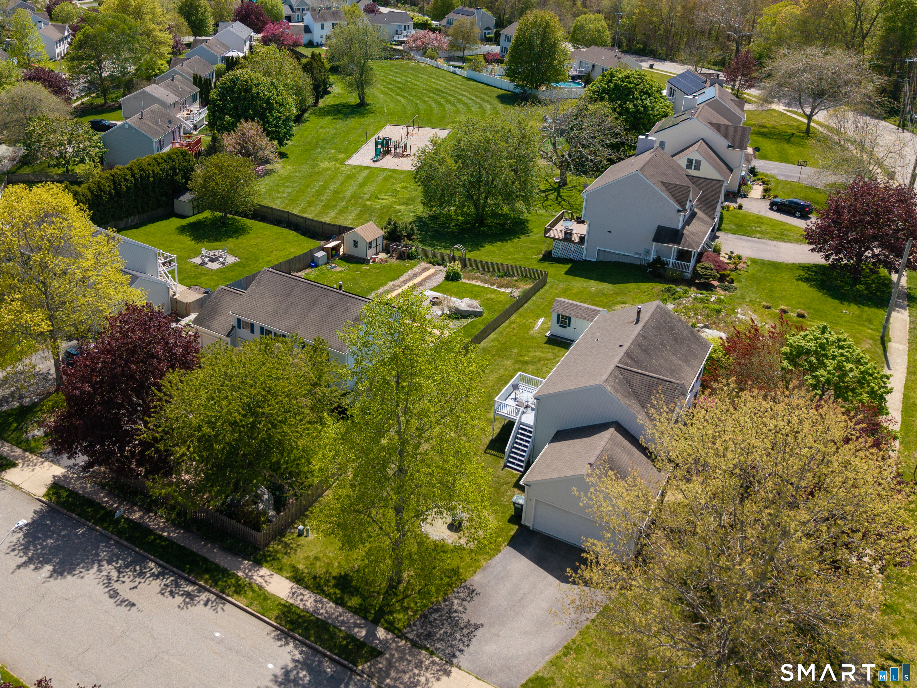 226 Noank Ledyard Road Groton, CT 06355 - Photo 24 of 26 an aerial view of a house with a garden