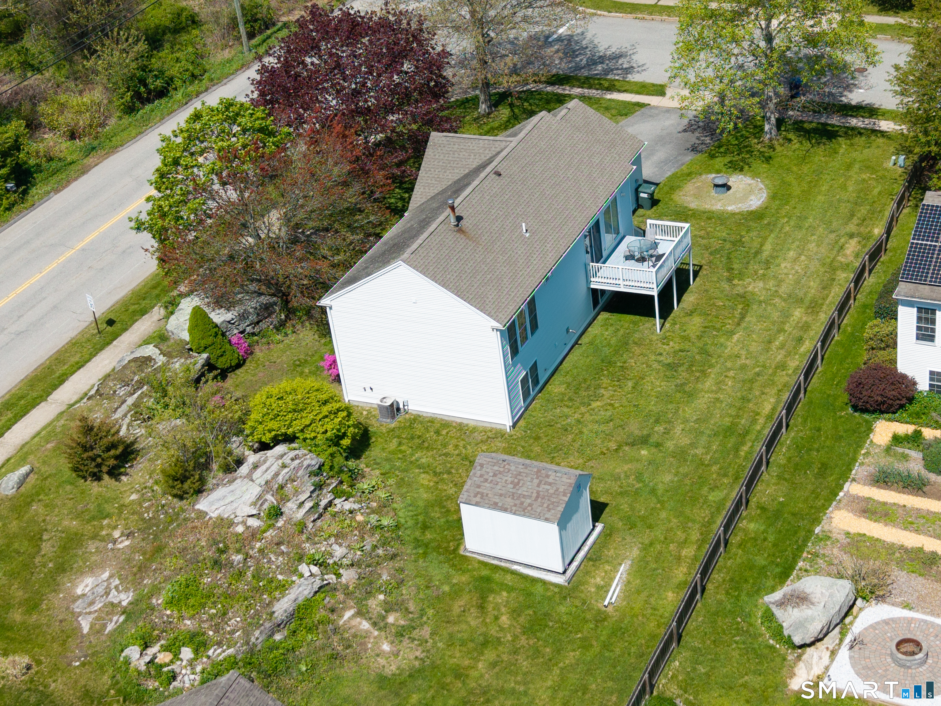 226 Noank Ledyard Road Groton, CT 06355 - Photo 25 of 26 an aerial view of a house with a garden and swimming pool