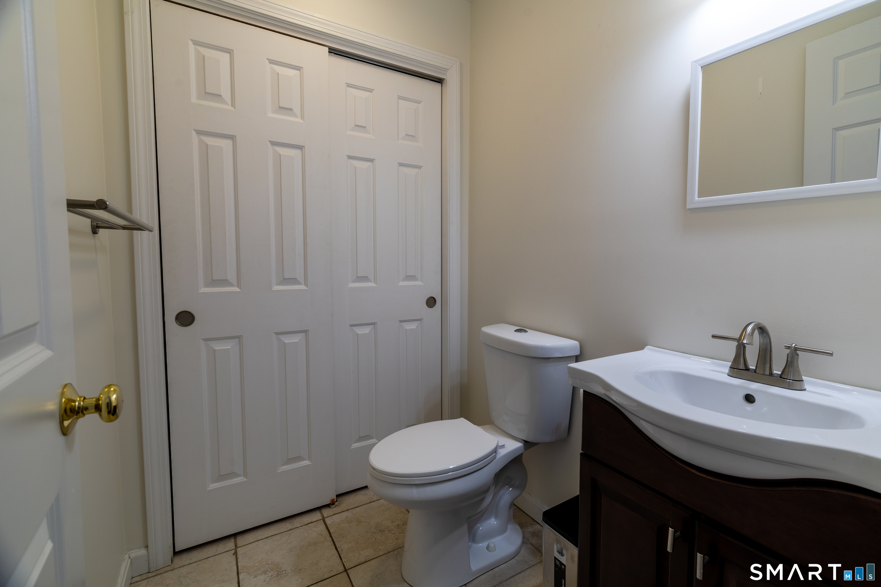 226 Noank Ledyard Road Groton, CT 06355 - Photo 8 of 26 a bathroom with a sink a toilet and shower