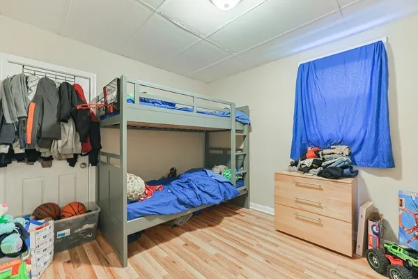 a room with toys and wooden floor
