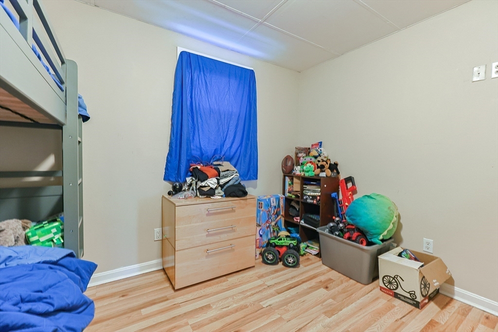 118 Maple Street Fall River, MA 02720 - Photo 20 of 36 a room with toys and wooden floor