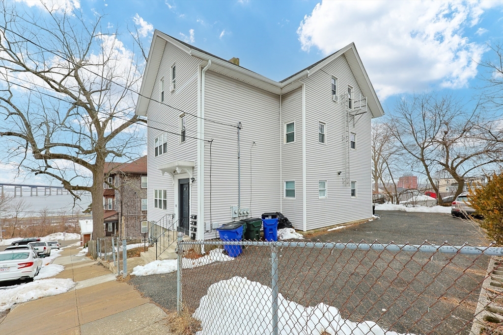 118 Maple Street Fall River, MA 02720 - Photo 2 of 36 a view of a patio with a yard