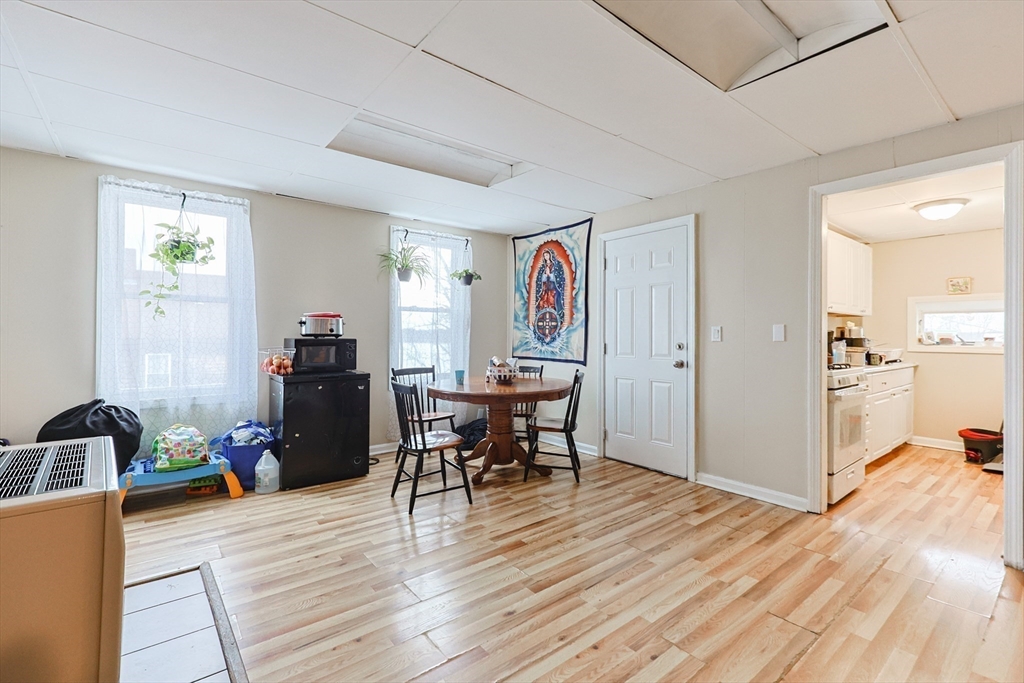 118 Maple Street Fall River, MA 02720 - Photo 21 of 36 a view of a dining room with furniture and wooden floor