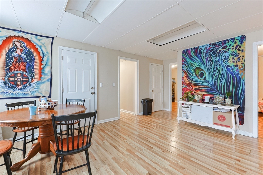 118 Maple Street Fall River, MA 02720 - Photo 24 of 36 a view of a dining room with furniture and wooden floor