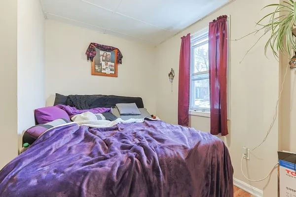 a view of a room with wooden walls