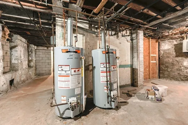 a view of empty room with wooden walls