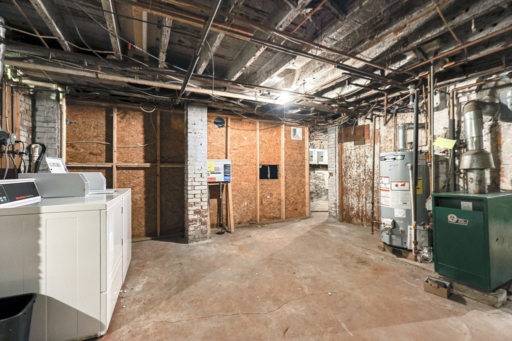 118 Maple Street Fall River, MA 02720 - Photo 32 of 36 a view of empty room with wooden walls