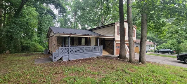front view of a house with a yard