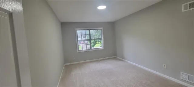 an empty room with a window