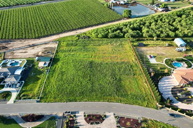 a view of swimming pool from a balcony