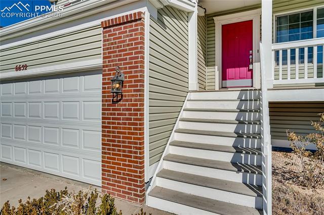 6652 Hannah Rose Road Colorado Springs, CO 80923 - Photo 2 of 28 Amazing Architecture and Design to Include the Custom Accent Stone & Large, Spacious, Covered Front Porch.