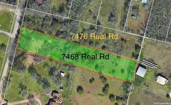 a view of swimming pool from a balcony