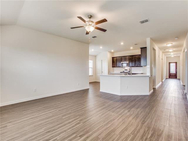 504 Brook View Court Anna, TX 75409 - Photo 3 of 10 a view of a kitchen with a sink and a stove top oven