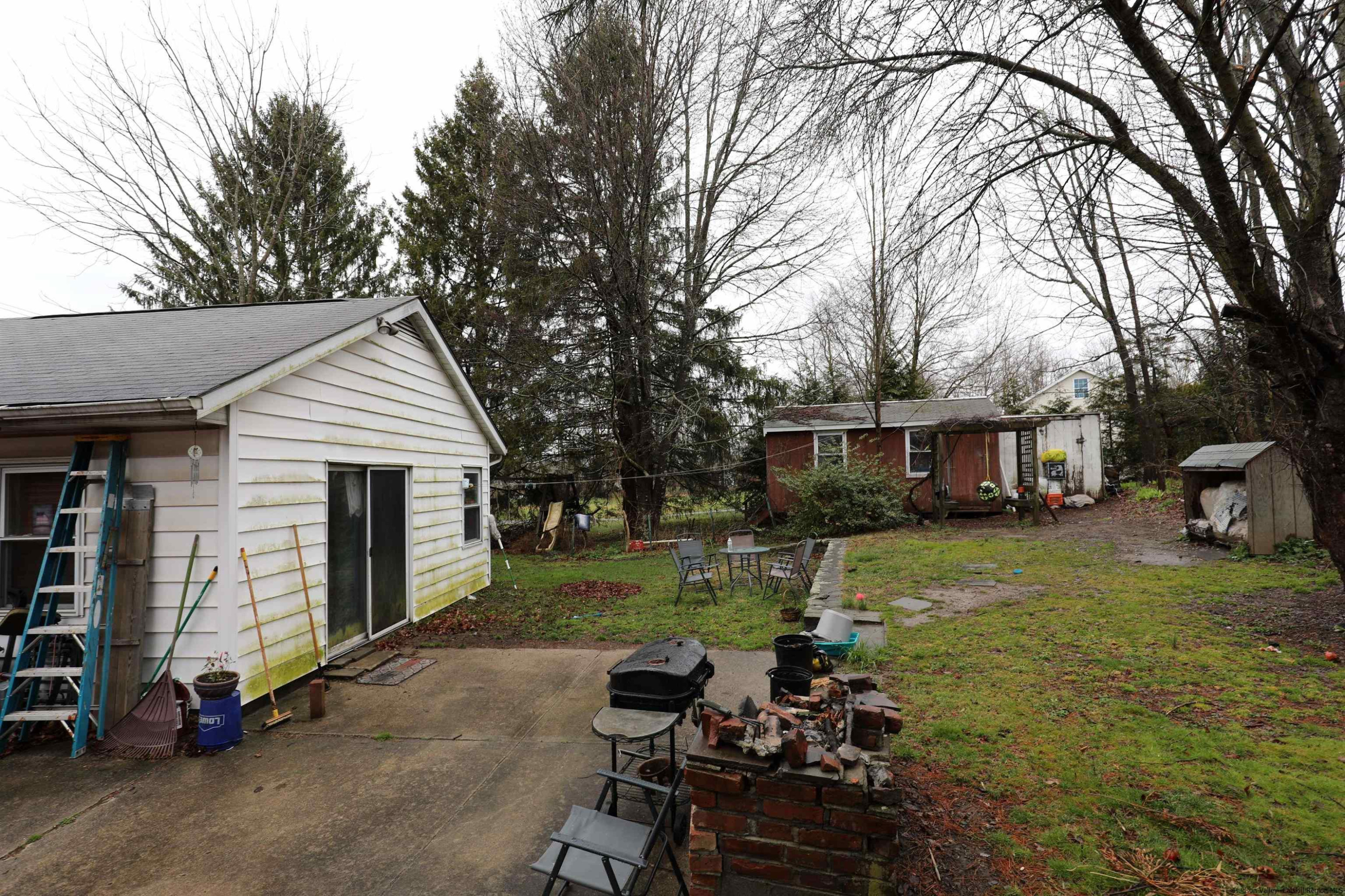 506 Plains Road Wallkill, NY 12589 - Photo 14 of 15 a view of a house with a yard