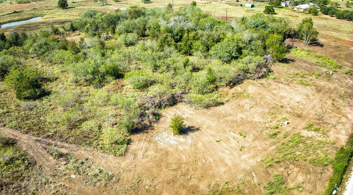 Lot 6 Sunset Trail Luling, TX 78648 - Photo 6 of 8 a view of a yard of a building