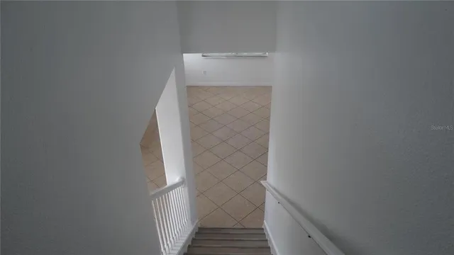 a view of a livingroom and window