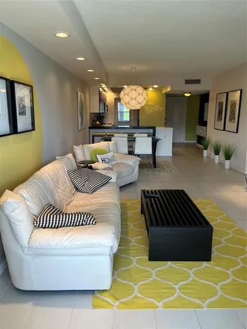 a bathroom with a toilet and shower