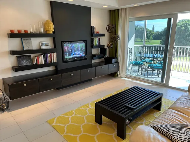 a view of balcony with furniture