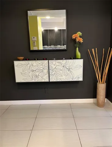 a view of kitchen with furniture and wooden floor