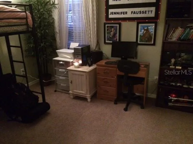 a room with furniture and musical instruments