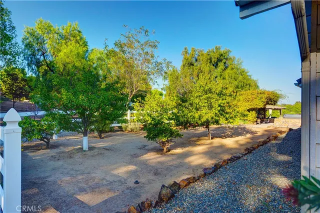 swimming pool view with a seating space