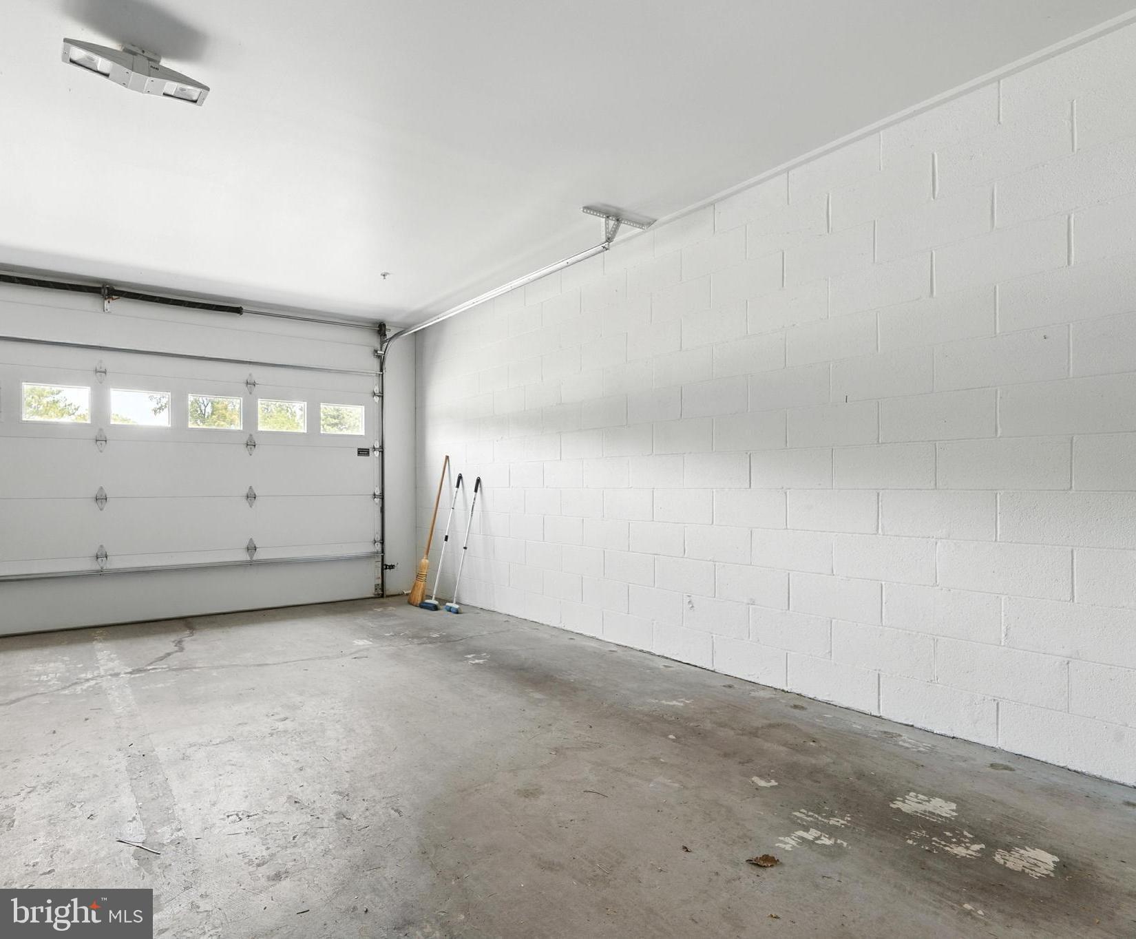 21090 West Sharp Street, Unit 133 Rock Hall, MD 21661 - Photo 25 of 40 an empty room with a empty space and windows